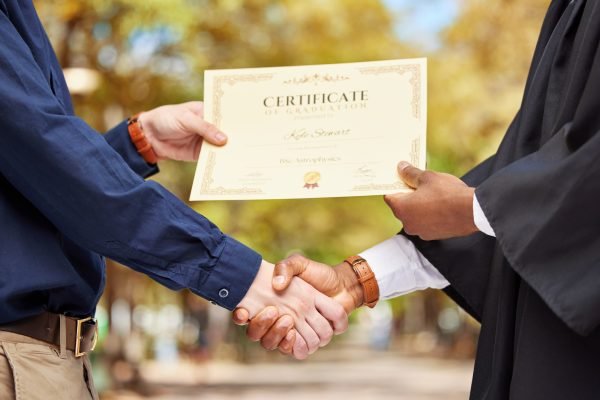 Shaking hands, graduation and certificate for college student with congratulations, professor and e Shaking hands, graduation and certificate for college student with congratulations, professor and e